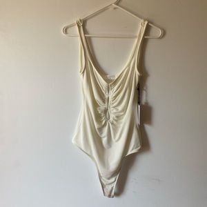 NWT ASTR th relabel white cut out bodysuit